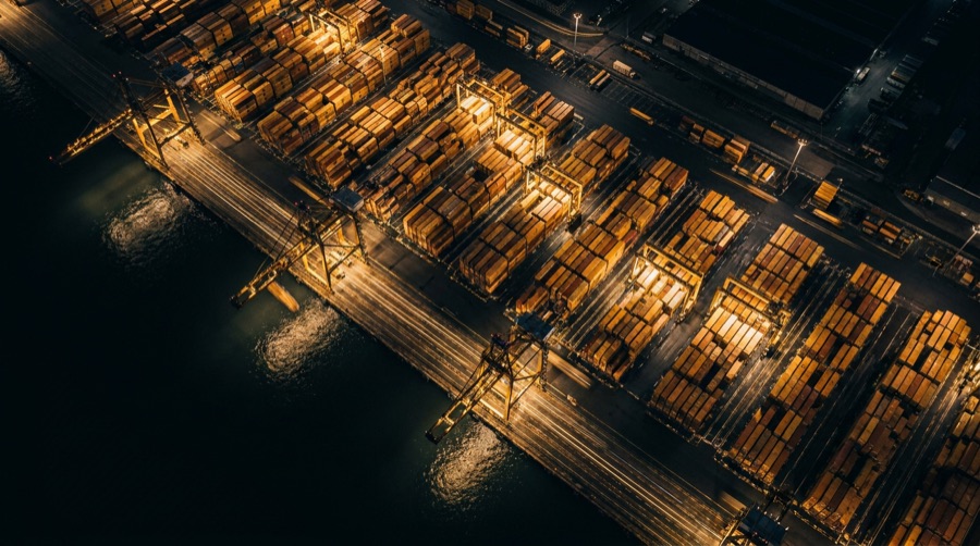 Container port at night representing resilient global supply chains